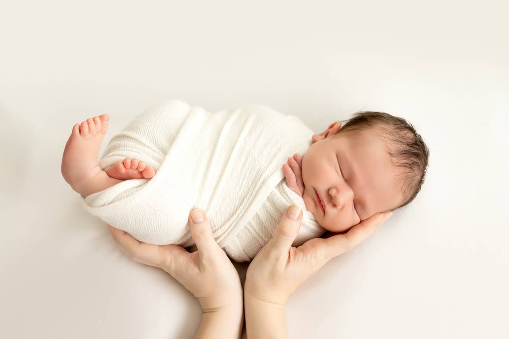 Swaddle baby for fashion naps